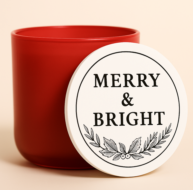 Red Christmas candle with a wooden lid labeled 'Merry & Bright'
