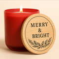 Red candle with a wooden lid labeled 'Merry & Bright' on a beige background
