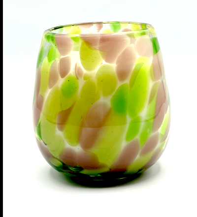 Hand-poured candle in a green and gray speckled glass vessel with a soothing fragrance blend and clean-burning olive oil wax.